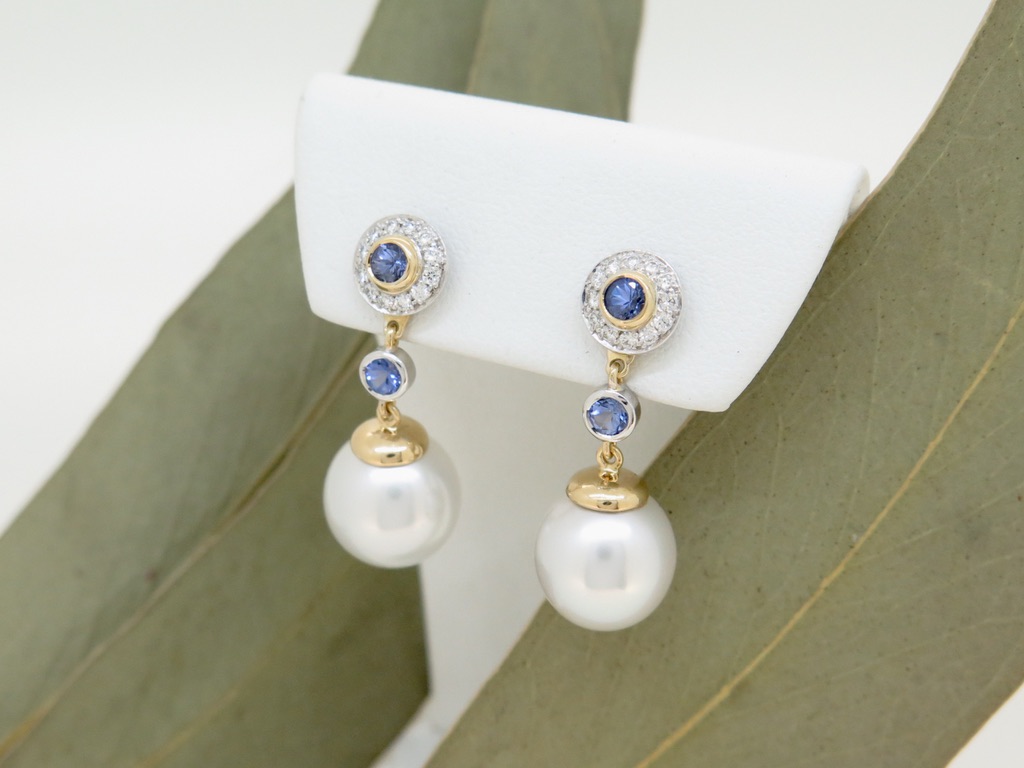 Handmade 18ct yellow and white gold earrings w/ detachable drops. Set with silvery australian south sea pearls, white diamonds and tanzanites