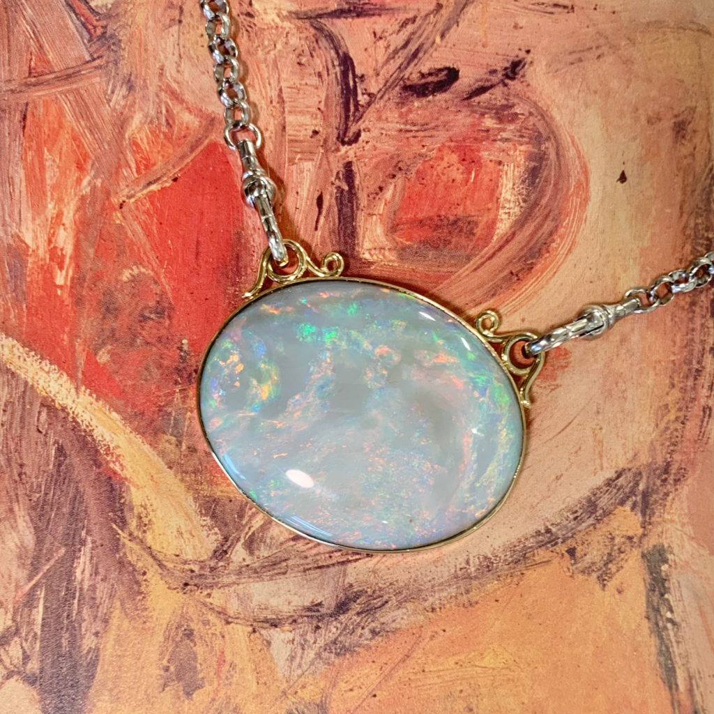 Handmade 9ct gold and sterling silver opal pendant