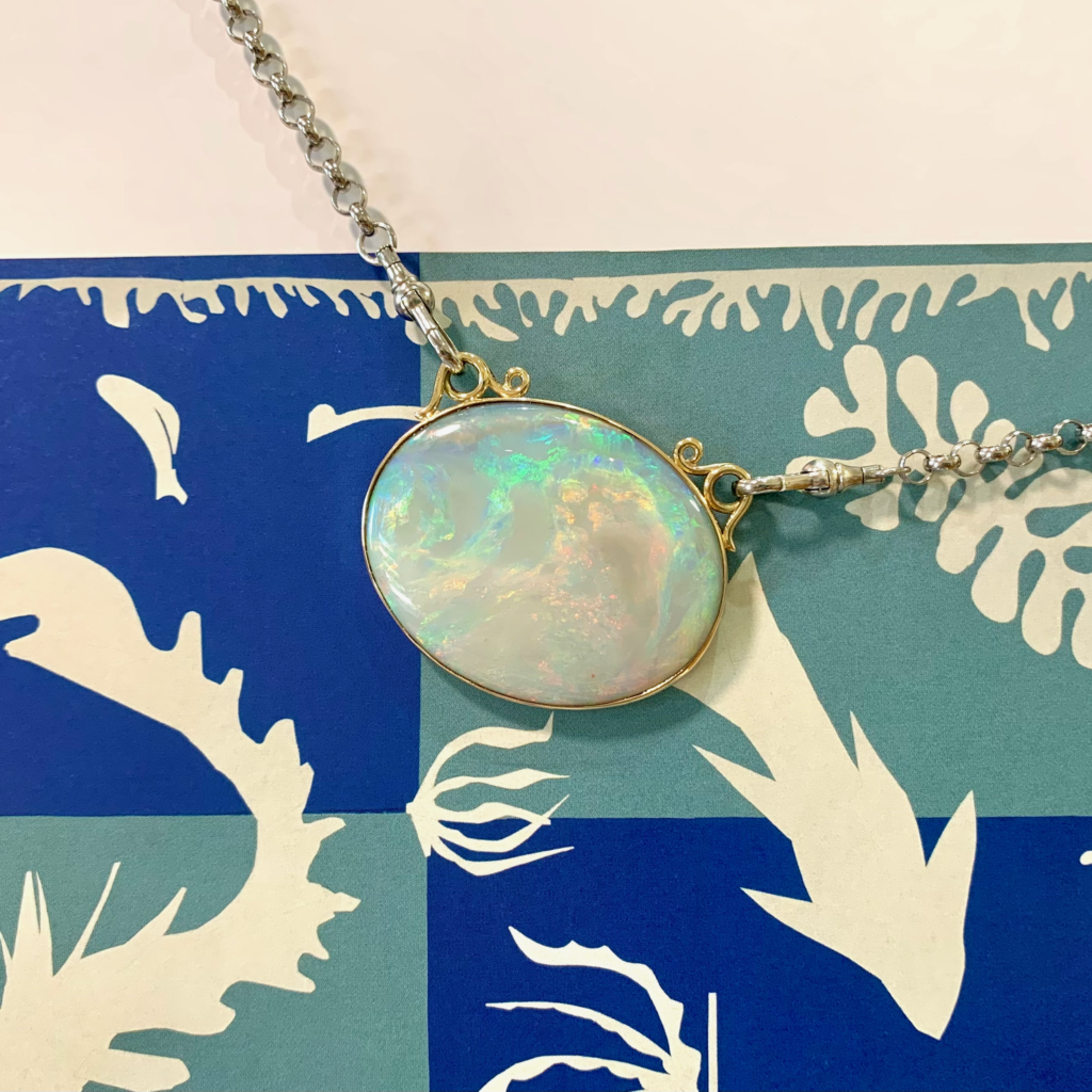 Handmade 9ct gold and sterling silver opal pendant