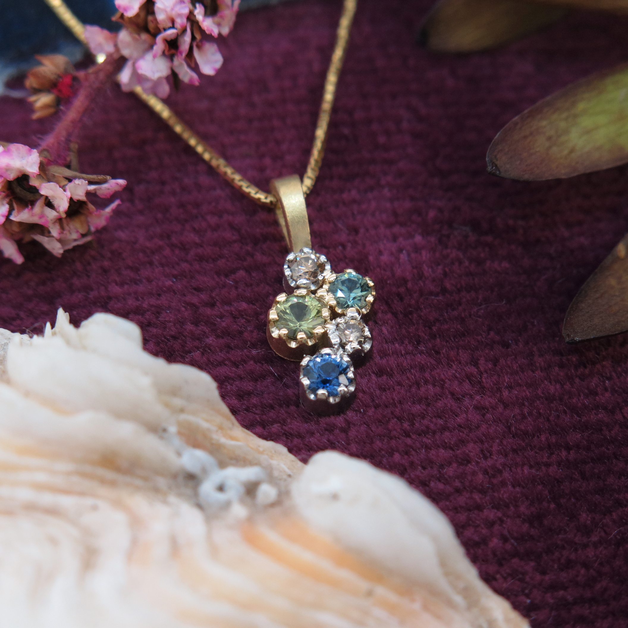 Handmade 18ct yellow gold, platinum, Sapphire and Diamond 'Star Cluster' pendant. Handmade 18ct yellow gold, platinum, Sapphire and Diamond 'Star Cluster' pendant.