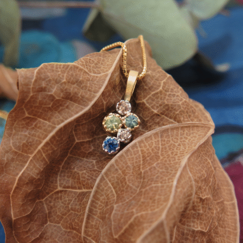Handmade 18ct yellow gold, platinum, Sapphire and Diamond 'Star Cluster' pendant.