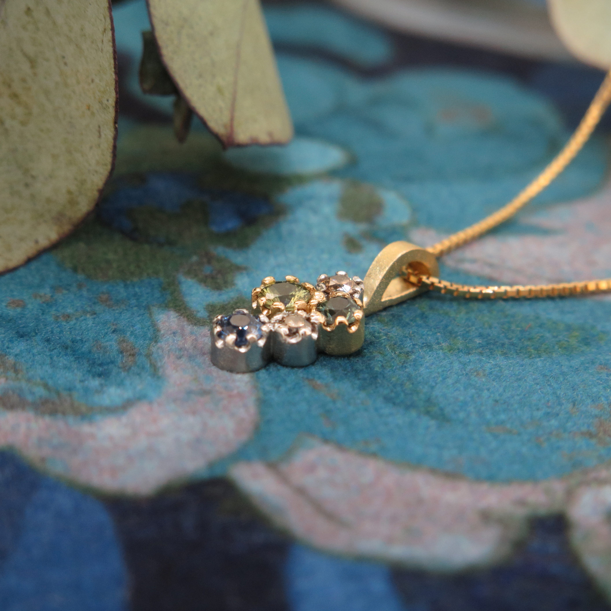 Handmade 18ct yellow gold, platinum, Sapphire and Diamond 'Star Cluster' pendant.
